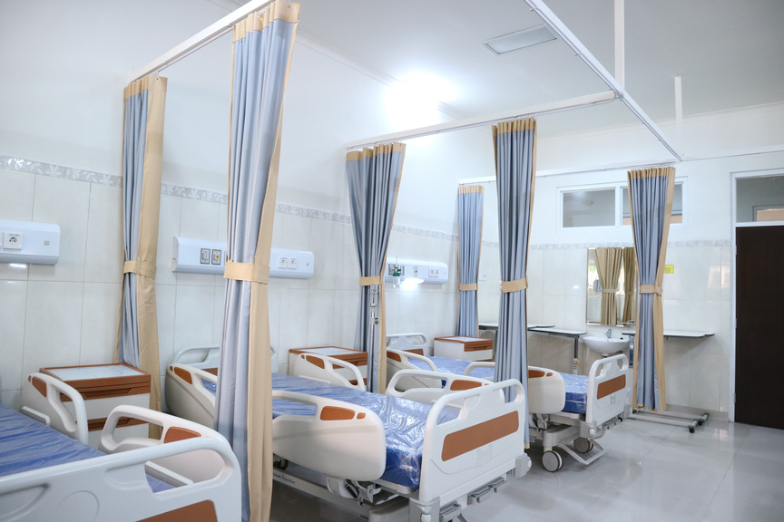White and Brown Hospital Beds